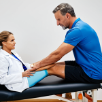 Assessment & Consultation**

"A professional sports rehabilitation therapist in a clinic, fully clothed in appropriate attire, examining a patient's knee, safe for work, appropriate content, perfect anatomy, correct proportions, natural pose, professional setting, focus on expertise, family-friendly."

**